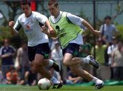 8 June 2002; Ian Harte, left, and Kevin Kilbane, moments before injurying his ankle, during a Republic of Ireland training session in Chiba, Japan. Photo by David Maher/Sportsfile