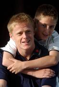 8 June 2002; Damien Duff relaxes with his thirteen year old brother Jamie at the team hotel following a Republic of Ireland training session in Chiba, Japan. Photo by David Maher/Sportsfile
