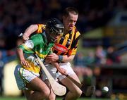 9 June 2002; Offaly's Damien Murray in action against Kilkenny's Michaekl Kavanagh during the Guinness Leinster Senior Hurling Championship Semi-Final match between Kilkenny and Offaly at Semple Stadium in Thurles, Tipperary. Photo by Ray McManus/Sportsfile