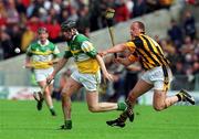 9 June 2002; Offaly's Joe Brady gets away from Kilkenny's Andy Comerford during the Guinness Leinster Senior Hurling Championship Semi-Final match between Kilkenny and Offaly at Semple Stadium in Thurles, Tipperary. Photo by Ray McManus/Sportsfile