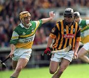 9 June 2002; Martin Comerford of Kilkenny in action against Offaly's Mick O'Hara during the Guinness Leinster Senior Hurling Championship Semi-Final match between Kilkenny and Offaly at Semple Stadium in Thurles, Tipperary. Photo by Aoife Rice/Sportsfile
