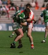 9 June 2002; Shane McDermott of Fermanagh in action against Armagh's Diarmaid Marsden during the Bank of Ireland Ulster Senior Football Championship Semi-Final match between Armagh and Fermanagh at St TiernachÕs Park in Clones, Monaghan. Photo by Damien Eagers/Sportsfile