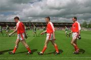 9 June 2002; Armagh players, from left, John McEntee, Oisin McConville and Steven McDonnell during the pre-match parade prior to the Bank of Ireland Ulster Senior Football Championship Semi-Final match between Armagh and Fermanagh at St TiernachÕs Park in Clones, Monaghan. Photo by Damien Eagers/Sportsfile