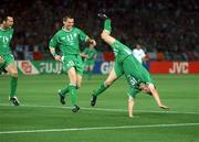 11 June 2002; Robbie Keane of Republic of Ireland celebrates with team-mates Gary Breen, left, and Kevin Kilbane, centre, after scoring his side's first goal during the FIFA World Cup 2002 Group E match between Saudi Arabia and Republic of Ireland at the International Stadium Yokohama in Yokohama, Japan. Photo by David Maher/Sportsfile