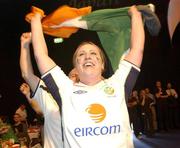 11 June 2002; Republic of Ireland supporters, from left, Clare Kavanagh from Kildare and Joe Boyle from Donegal celebrate following their side's victory during the FIFA World Cup 2002 Group E match between Saudi Arabia and Republic of Ireland at the 'Big In Japan' event at the RDS in Ballsbridge, Dublin. Photo by Aoife Rice/Sportsfile