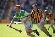 9 June 2002; Simon Whelahan of Offaly in action against Kilkenny's Michael Kavanagh during the Guinness Leinster Senior Hurling Championship Semi-Final match between Kilkenny and Offaly at Semple Stadium in Thurles, Tipperary. Photo by Aoife Rice/Sportsfile