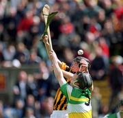 9 June 2002; Joe Errity of Offaly of in action against Kilkenny's Martin Comerford during the Guinness Leinster Senior Hurling Championship Semi-Final match between Kilkenny and Offaly at Semple Stadium in Thurles, Tipperary. Photo by Ray McManus/Sportsfile