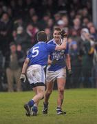 24 December 2011; St. Mary's players Maurice Fitzgerald, right, and Niall O'Driscoll celebrate their side's victory. South Kerry Senior Football Championship Final, St. Mary's v Dromid Pearses, Waterville Sportsfield, Waterville, Co. Kerry. Picture credit: Stephen McCarthy / SPORTSFILE