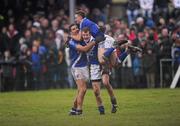 24 December 2011; St. Mary's players, from left, Maurice Fitzgerald, Niall O'Driscoll and Paul O'Donoghue, on top, celebrate their side's victory. South Kerry Senior Football Championship Final, St. Mary's v Dromid Pearses, Waterville Sportsfield, Waterville, Co. Kerry. Picture credit: Stephen McCarthy / SPORTSFILE