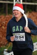 25 December 2011; Siobhan Dunphy, from Rathfarnham, Dublin, finishing one of the many GOAL Mile's. Annual Goal Mile, Leopardstown Race Course, Dublin. Picture credit: Ray McManus / SPORTSFILE
