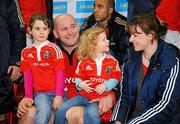 26 December 2011; John Hayes, Munster, on the bench during the final moments of the game with his wife Fiona and daughters Sally, age 5, left, and Roisin, age 2. Celtic League, Munster v Connacht, Thomond Park, Limerick. Picture credit: Diarmuid Greene / SPORTSFILE