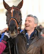 28 December 2011; Chief Executive of Ryanair Michael O'Leary in the parade ring with his horse Last Instalment, who he sent out with Brian O'Connell up, to win the Topaz Fort Leney Novice Steeplechase. Leopardstown Christmas Racing Festival 2011, Leopardstown Racecourse, Leopardstown, Dublin. Picture credit: Barry Cregg / SPORTSFILE