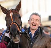 28 December 2011; Chief Executive of Ryanair Michael O'Leary in the parade ring with his horse Last Instalment, who he sent out with Brian O'Connell up, to win the Topaz Fort Leney Novice Steeplechase. Leopardstown Christmas Racing Festival 2011, Leopardstown Racecourse, Leopardstown, Dublin. Picture credit: Barry Cregg / SPORTSFILE