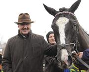 29 December 2011; Trainer Dermot Weld in the parade ring with his horse Unaccompied who he sent out with Paul Townend up to win the Istabraq Festival Hurdle. Leopardstown Christmas Racing Festival 2011, Leopardstown Racecourse, Leopardstown, Dublin. Picture credit: Barry Cregg / SPORTSFILE
