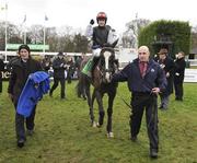 29 December 2011; Unaccompanied, with Paul Townend up, are led into the parade ring after winning the Istabraq Festival Hurdle. Leopardstown Christmas Racing Festival 2011, Leopardstown Racecourse, Leopardstown, Dublin. Picture credit: Barry Cregg / SPORTSFILE