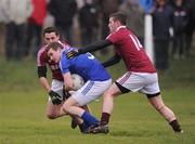 24 December 2011; Brian Curran, St. Mary's, in action against Thomas Curran, left, and Niall O Se, Dromid Pearses. South Kerry Senior Football Championship Final, St. Mary's v Dromid Pearses, Waterville Sportsfield, Waterville, Co. Kerry. Picture credit: Stephen McCarthy / SPORTSFILE