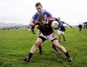 24 December 2011; Niall O Se, Dromid Pearses, in action against Brian Curran, St. Mary's. South Kerry Senior Football Championship Final, St. Mary's v Dromid Pearses, Waterville Sportsfield, Waterville, Co. Kerry. Picture credit: Stephen McCarthy / SPORTSFILE