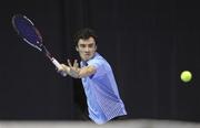 30 December 2011; Ciaran Fitzgerald, Greystones, Co. Wicklow, in action against Lazio Kukhalashvili, DCU, Co. Dublin, during their Men's Singles semi-final. National Indoor Tennis Championship Semi-Finals, David Lloyd Riverview, Clonskeagh, Dublin. Photo by Sportsfile