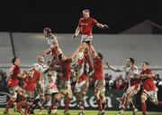 30 December 2011; Mick O'Driscoll, Munster, offloads possession from a lineout against Johann Muller, Ulster. Celtic League, Ulster v Munster, Ravenhill Park, Belfast, Co. Antrim. Picture credit: Oliver McVeigh / SPORTSFILE