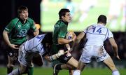 1 January 2012; Tiernan O'Halloran, Connacht, is tackled by Shane Jennings, left, and David Kearney, Leinster. Celtic League, Connacht v Leinster, Sportsground, Galway. Picture credit: Diarmuid Greene / SPORTSFILE