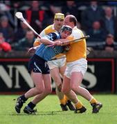 Dublin's Brian McMahon is tackled by Terence McNaughton  at Parnell Park 11/5/97 Photograph Ray McManus SPORTSFILE