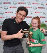 31 May 2017; SPAR FAI Primary School 5s Programme ambassador and former Republic of Ireland International Keith Andrews presents the Player of the Tournament Section B trophy to Elisha Bohan, from Carnmore NS, Co Galway, during the SPAR FAI Primary School 5s National Finals at Aviva Stadium where girls and boys from 12 counties battled it out for national honours. The 2017 SPAR FAI Primary School 5s Programme was the biggest yet as almost 28,576 children from 1,495 schools took part in county, regional and provincial blitzes nationwide. For further information please see www.spar.ie or www.faischools.ie Photo by Cody Glenn/Sportsfile