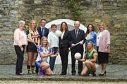 6 June 2017; Minister for Transport, Tourism and Sport, Shane Ross with Patrick O’Donovan TD, Minister of State for Tourism and Sport who were joined by from left Camogie Association CEO, Joan O’Flynn, WGPA President, Aoife Lane, Sinead McNulty from DIT, Ladies Gaelic Football Players Ellen McCarron from Monaghan and Niamh Lister from Meath and Camogie players Edwina Keane from Kilkenny and Ali Twomey from Dublin and LGFA President, Marie Hickey, were all present to announce funding to the value of €428,000 which will be provided to adult intercounty Camogie and Ladies Gaelic Football teams in the coming weeks. €500,000 worth of funding will be provided in 2017 and again in 2018. The funding, which will be distributed through Sport Ireland, was agreed following a joint proposal by the Camogie Association, the LGFA and the WGPA . Wilson Hartnell, Ely Place, Dublin. Photo by Matt Browne/Sportsfile