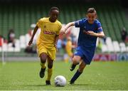 31 May 2017; Mark Mbuli of Dooish NS, Co Donegal, in action against Ryan Doran of St Peter's NS, Co Louth, during the SPAR FAI Primary School 5s National Finals at Aviva Stadium, in Lansdowne Rd, Dublin 4. Photo by Sam Barnes/Sportsfile