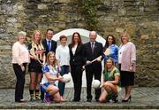 6 June 2017; Minister for Transport, Tourism and Sport, Shane Ross with Patrick O’Donovan TD, Minister of State for Tourism and Sport who were joined by from left Camogie Association CEO, Joan O’Flynn, WGPA President, Aoife Lane, Sinead McNulty from DIT, Ladies Gaelic Football Players Ellen McCarron from Monaghan and Niamh Lister from Meath and Camogie players Edwina Keane from Kilkenny and Ali Twomey from Dublin and LGFA President, Marie Hickey, were all present to announce funding to the value of €428,000 which will be provided to adult intercounty Camogie and Ladies Gaelic Football teams in the coming weeks. €500,000 worth of funding will be provided in 2017 and again in 2018. The funding, which will be distributed through Sport Ireland, was agreed following a joint proposal by the Camogie Association, the LGFA and the WGPA . Wilson Hartnell, Ely Place, Dublin. Photo by Matt Browne/Sportsfile