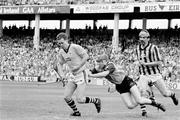 21 July 1991; Kilkenny goalkeeper Michael Walsh, supported by team-mate John Henderson, clears under pressure from Brian McMahon, Dublin. Leinster Senior Hurling Championship Final, Dublin v Kilkenny, Croke Park, Dublin. Picture credit; Connolly Collection / SPORTSFILE