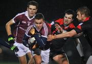 4 January 2012; Conor Halloran, Galway, in action against Stephen Henry, right, and Seamus Ryder, Sligo IT. FBD Insurance League, Section A, Round 1, Sligo IT v Galway, Connacht GAA Centre of Excellence, Ballyhaunis, Co. Mayo. Picture credit: David Maher / SPORTSFILE