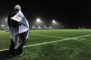 4 January 2012; A general view of a spectator holdin up an umbrella during heavy wind and rain before the game. FBD Insurance League, Section A, Round 1, Sligo v NUIG, Connacht GAA Centre of Excellence, Ballyhaunis, Co. Mayo. Picture credit: David Maher / SPORTSFILE