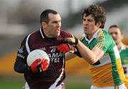8 January 2012; Michael Ennis, Westmeath, in action against Richie Dalton, Offaly. Bord Na Mona O'Byrne Cup, First Round, Offaly v Westmeath, O'Connor Park, Tullamore, Co. Offaly. Picture credit: Pat Murphy / SPORTSFILE