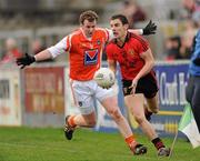 8 January 2012; Daniel Hughes, Down, in action against Eugene McDonnell, Armagh. Dr. McKenna Cup, Section B, Down v Armagh, Pairc Esler, Newry, Co. Down. Picture credit: Oliver McVeigh / SPORTSFILE