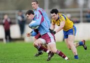 8 January 2012; Johnny Duane, GMIT, in action against David O'Gara, Roscommon. FBD Insurance League, Section B, Round 1, G.M.I.T. v Roscommon, St Aidan's GAA Club, Ballyforan, Co. Roscommon. Picture credit: Brian Lawless / SPORTSFILE