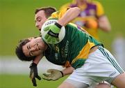 8 January 2012; Paddy Gilsenan, Meath, holds off the challenge of Sean Culleton, Wexford. Bord Na Mona O'Byrne Cup, First Round, Meath v Wexford, Pairc Tailteann, Navan, Co. Meath. Picture credit: Brendan Moran / SPORTSFILE