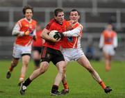 8 January 2012; Aidan Carr, Down, in action against Andy Mallon, Armagh. Dr. McKenna Cup, Section B, Down v Armagh, Pairc Esler, Newry, Co. Down. Picture credit: Oliver McVeigh / SPORTSFILE