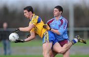 8 January 2012; Colin Compton, Roscommon, in action against Aonghus Tierney, GMIT. FBD Insurance League, Section B, Round 1, G.M.I.T. v Roscommon, St Aidan's GAA Club, Ballyforan, Co. Roscommon. Picture credit: Brian Lawless / SPORTSFILE