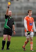 8 January 2012; Referee Martin Sludden issues David Lavery, Armagh, with a yellow card. Dr. McKenna Cup, Section B, Down v Armagh, Pairc Esler, Newry, Co. Down. Picture credit: Oliver McVeigh / SPORTSFILE