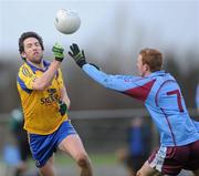 8 January 2012; Cathal Dineen, Roscommon, in action against Jason McLoughlin, GMIT. FBD Insurance League, Section B, Round 1, G.M.I.T. v Roscommon, St Aidan's GAA Club, Ballyforan, Co. Roscommon. Picture credit: Brian Lawless / SPORTSFILE