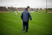8 January 2012; Meath manager Seamus McEnaney walks out to his players before the game. Bord Na Mona O'Byrne Cup, First Round, Meath v Wexford, Pairc Tailteann, Navan, Co. Meath. Picture credit: Brendan Moran / SPORTSFILE