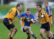8 January 2012; Billy Cullen, Wicklow, in action against Dean Rock,11, and Eoin Culligan, DCU. Bord Na Mona O'Byrne Cup, First Round, Wicklow v DCU, Baltinglass GAA Club, Newtownsaunders, Baltinglass, Co. Wicklow. Picture credit: Matt Browne / SPORTSFILE