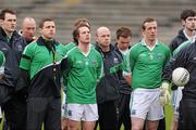 8 January 2012; Fermanagh manager Peter Canavan stands with his team during the National Anthem. Dr. McKenna Cup, Section A, Fermanagh v Antrim, Brewster Park, Enniskillen, Co. Fermanagh. Photo by Sportsfile