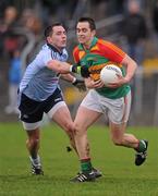 8 January 2012; Ed Finnegan, Carlow, in action against Declan Lally, Dublin. Bord Na Mona O'Byrne Cup, First Round, Carlow v Dublin, Dr. Cullen Park, Carlow. Picture credit: Stephen McCarthy / SPORTSFILE