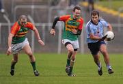 8 January 2012; Bryan Cullen, Dublin, in action against Tony Bolger, left, and Brian Murphy, Carlow. Bord Na Mona O'Byrne Cup, First Round, Carlow v Dublin, Dr. Cullen Park, Carlow. Picture credit: Stephen McCarthy / SPORTSFILE