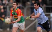 8 January 2012; Ed Finnegan, Carlow, in action against Michael Darragh MacAuley, Dublin. Bord Na Mona O'Byrne Cup, First Round, Carlow v Dublin, Dr. Cullen Park, Carlow. Picture credit: Stephen McCarthy / SPORTSFILE
