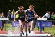 3 June 2017; Tim Scott of St Malachy's, Co Dublin, left, and Ricki Mulcaire of St Flannan's, Co Clare, competing in the Intermediate Boy's 1500m Steeplechase during the Irish Life Health All Ireland Schools Track & Field Championships 2017 at Tullamore Harrier Stadium, in Co. Offaly. Photo by Sam Barnes/Sportsfile