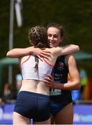 3 June 2017; Ciara Neville of Castletroy College, Co Limerick, embraces Aoife Rochford of CB Enniscorthy, Co Wexford, after winning the Senior Girl's 100m during the Irish Life Health All Ireland Schools Track & Field Championships 2017 at Tullamore Harrier Stadium, in Co. Offaly. Photo by Sam Barnes/Sportsfile