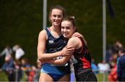 3 June 2017; Ciara Neville of Castletroy College, Co Limerick, embraces Aoife Lynch of Luttrellstown, Co Dublin, after winning the Senior Girl's 100m during the Irish Life Health All Ireland Schools Track & Field Championships 2017 at Tullamore Harrier Stadium, in Co. Offaly. Photo by Sam Barnes/Sportsfile