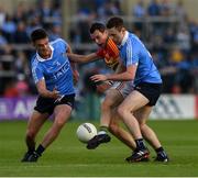 3 June 2017; Sean Gannon of Carlow in action against Eric Lowndes , left, and Jack McCaffrey of Dublin during the Leinster GAA Football Senior Championship Quarter-Final match between Dublin and Carlow at O'Moore Park, Portlaoise, in Co. Laois.  Photo by Ray McManus/Sportsfile